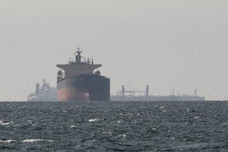 Cargo ships in the Gulf, near the Strait of Hormuz, as seen from northern Ras al-Khaimah, near the border with Oman's Musandam governance